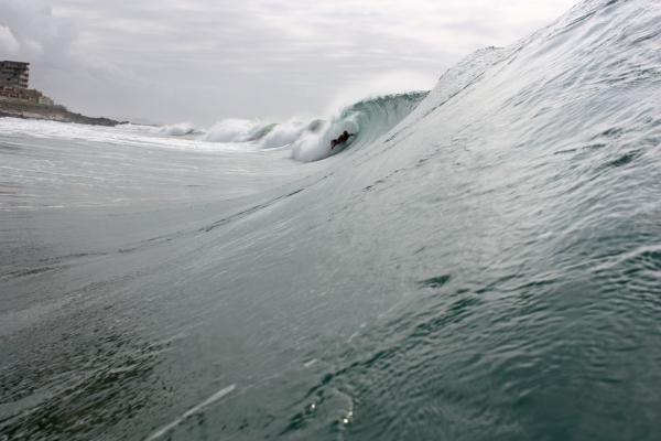 Dane Lott, dropknee forehand tube/barrel at Rock Spot